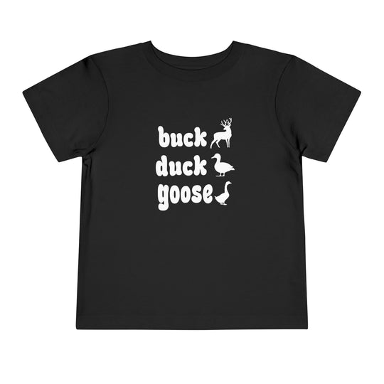 Buck, Duck, Goose Toddler Tee featuring playful animal silhouettes and text on a black short sleeve, 100% Airlume cotton, designed for comfort with tear-away label.