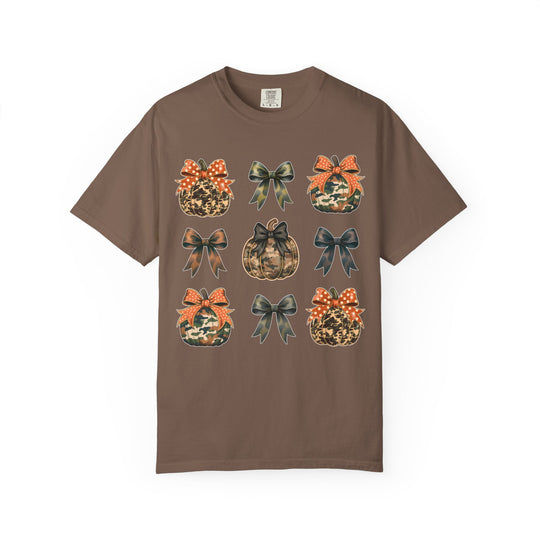 Bows and Pumpkins Tee: Brown crew-neck featuring a 3x3 grid of camouflage and animal-print pumpkins with matching bows, perfect for a relaxed, stylish look.