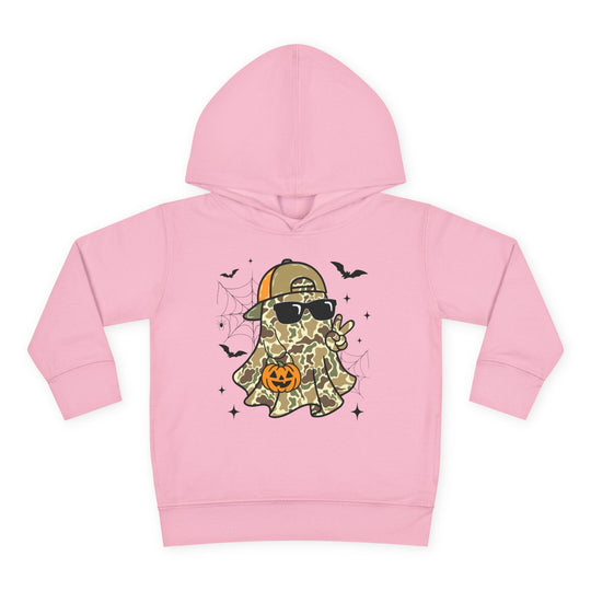 Candy Ghost Toddler Hoodie features a cartoon ghost in camo, sunglasses, peace sign, with Halloween elements, ensuring cozy comfort with durable stitching and side-seam pockets.