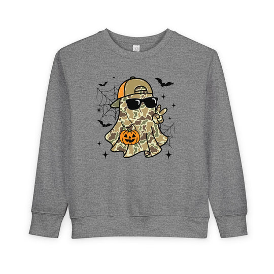 Candy Ghost Toddler Crew: Heather-gray sweatshirt featuring a camo-clad ghost with sunglasses, a backward cap, peace sign, jack-o’-lantern bucket, bats, and spiderwebs.