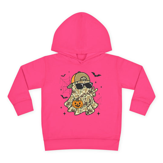 Candy Ghost Toddler Hoodie: A pink hoodie featuring a camo ghost with sunglasses and cap, holding a jack-o’-lantern, surrounded by bats and spiderwebs.