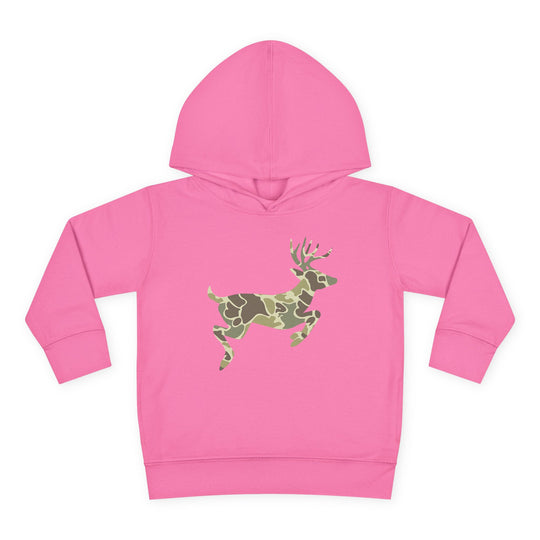 Camo Deer Toddler Hoodie featuring a green/tan camouflage deer silhouette on a pink background, showcasing a cozy design with jersey-lined hood and side-seam pockets.