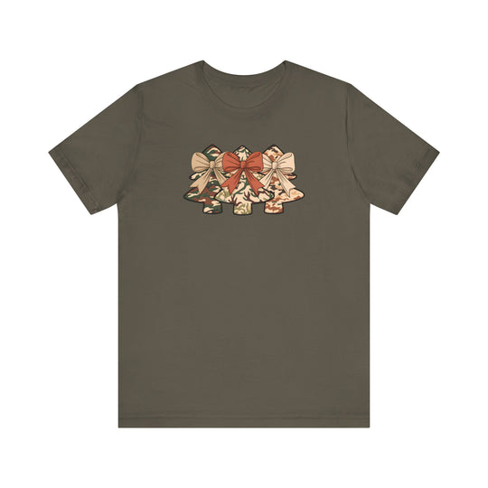 Olive-green tee with camo print Christmas tree silhouettes and bows, showcasing a festive, unique design. Made of soft, durable cotton for a comfortable fit.