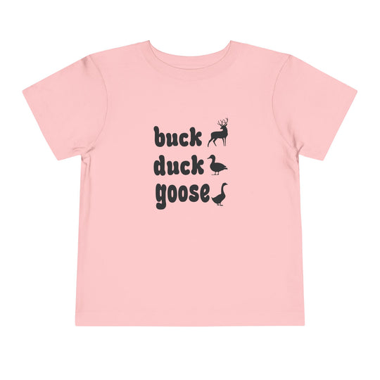 Buck, Duck, Goose Toddler Tee featuring playful black silhouettes of a deer, duck, and goose, printed on a light-pink Bella Canvas toddler T-shirt.