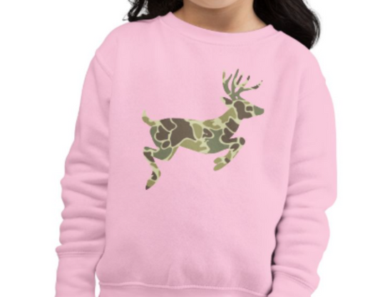 Toddler in pink sweatshirt with camo deer silhouette, showcasing durable, cozy design from Worlds Worst Tees.