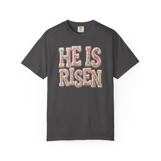 Charcoal T-shirt with HE IS RISEN in pastel floral embroidery pattern, reflecting Faith Family Designs' unique and inspirational style.