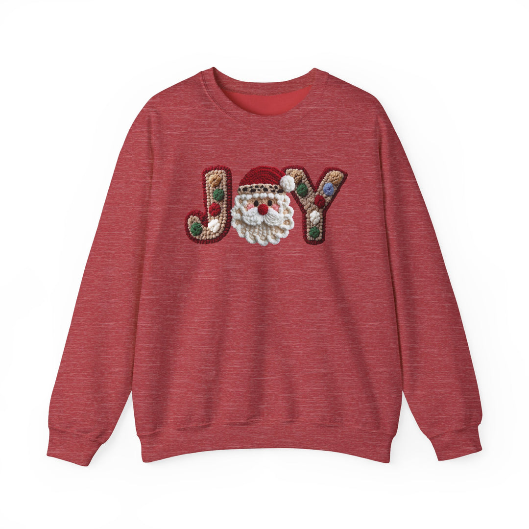 Red crew-neck sweatshirt with JOY motif; J and Y resemble holiday cookies, O is a Santa-face. Cozy polyester-cotton blend, ribbed collar, classic fit.