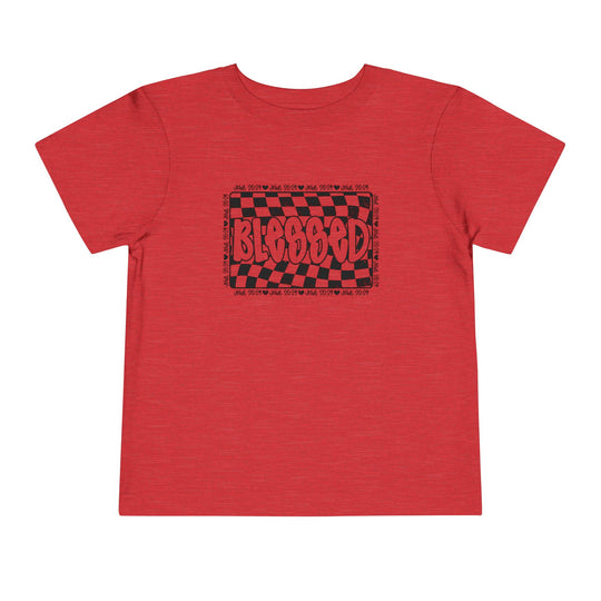 Blessed Toddler Tee: A red short sleeve tee for toddlers featuring a playful black and red graphic, crafted from soft Airlume cotton for comfort.