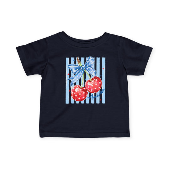 American Cherry Baby Tee: Navy-blue toddler T-shirt featuring red cherries with a star-patterned bow and America script, designed for comfort and durability.