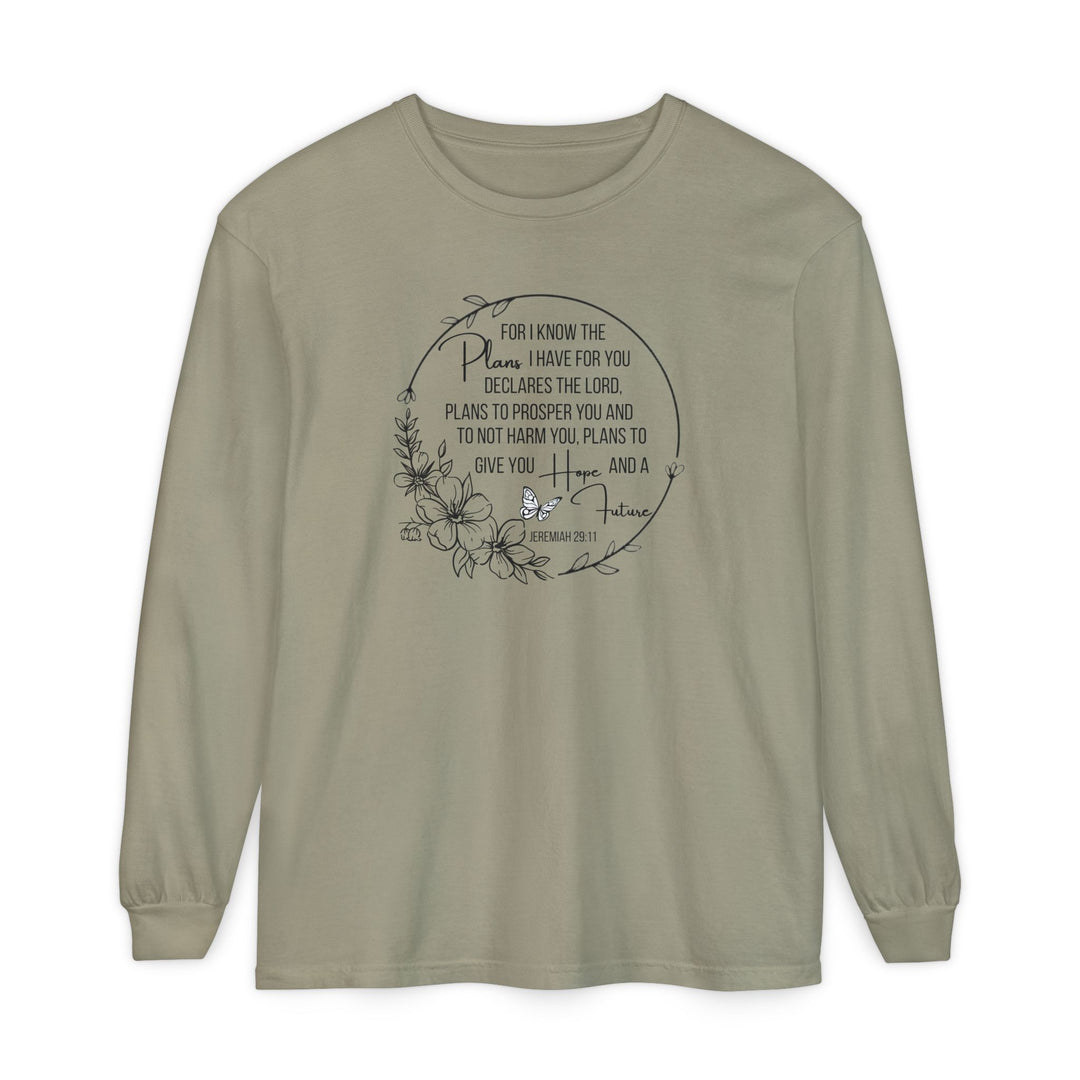 Plans Hope Future Long Sleeve Tee in muted olive features a circular floral wreath with butterfly and Jeremiah 29:11 verse, offering comfort with 100% ring-spun cotton.