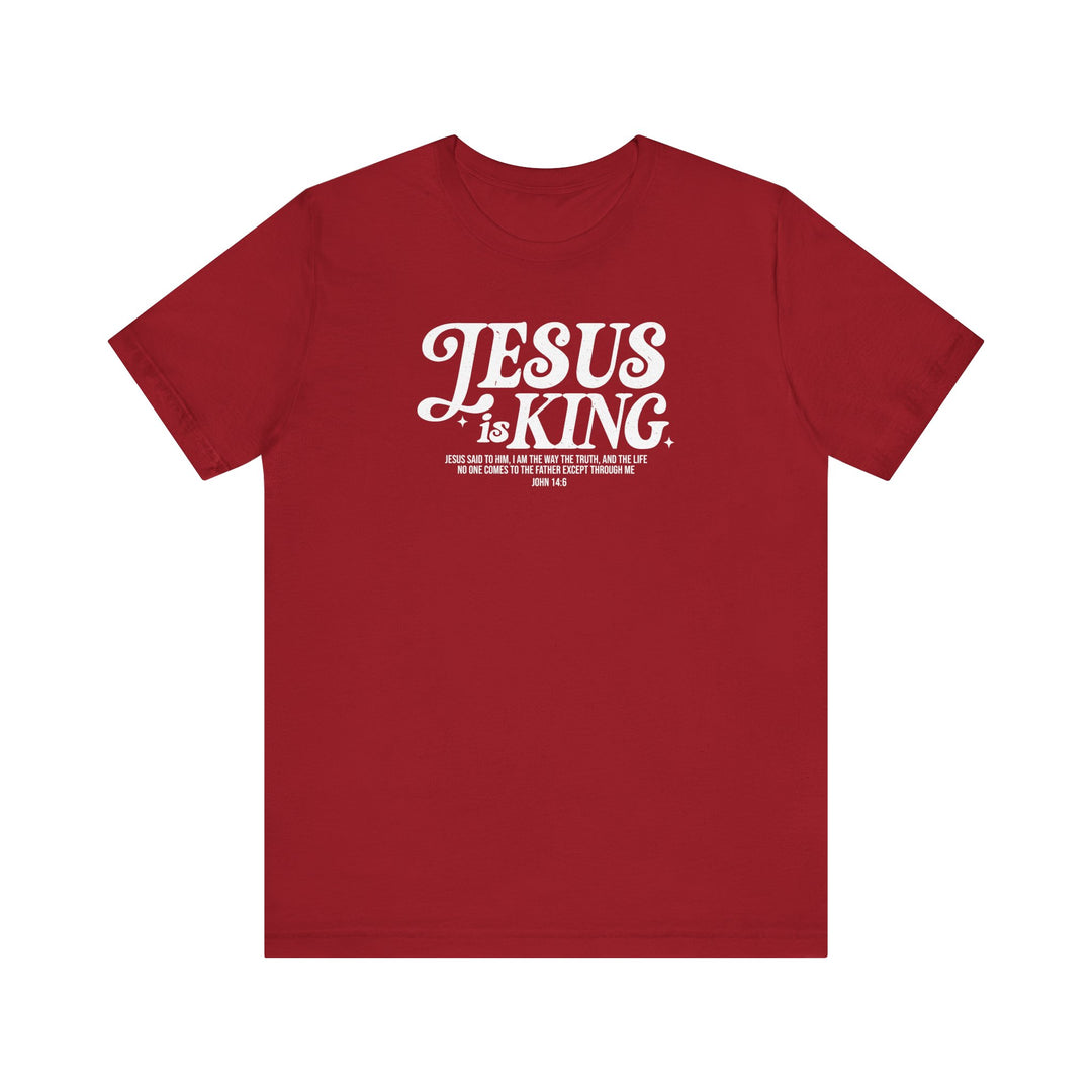 Jesus is King Tee featuring white text on a soft red fabric, classic unisex fit with ribbed knit collars, perfect for a comfortable, stylish look.