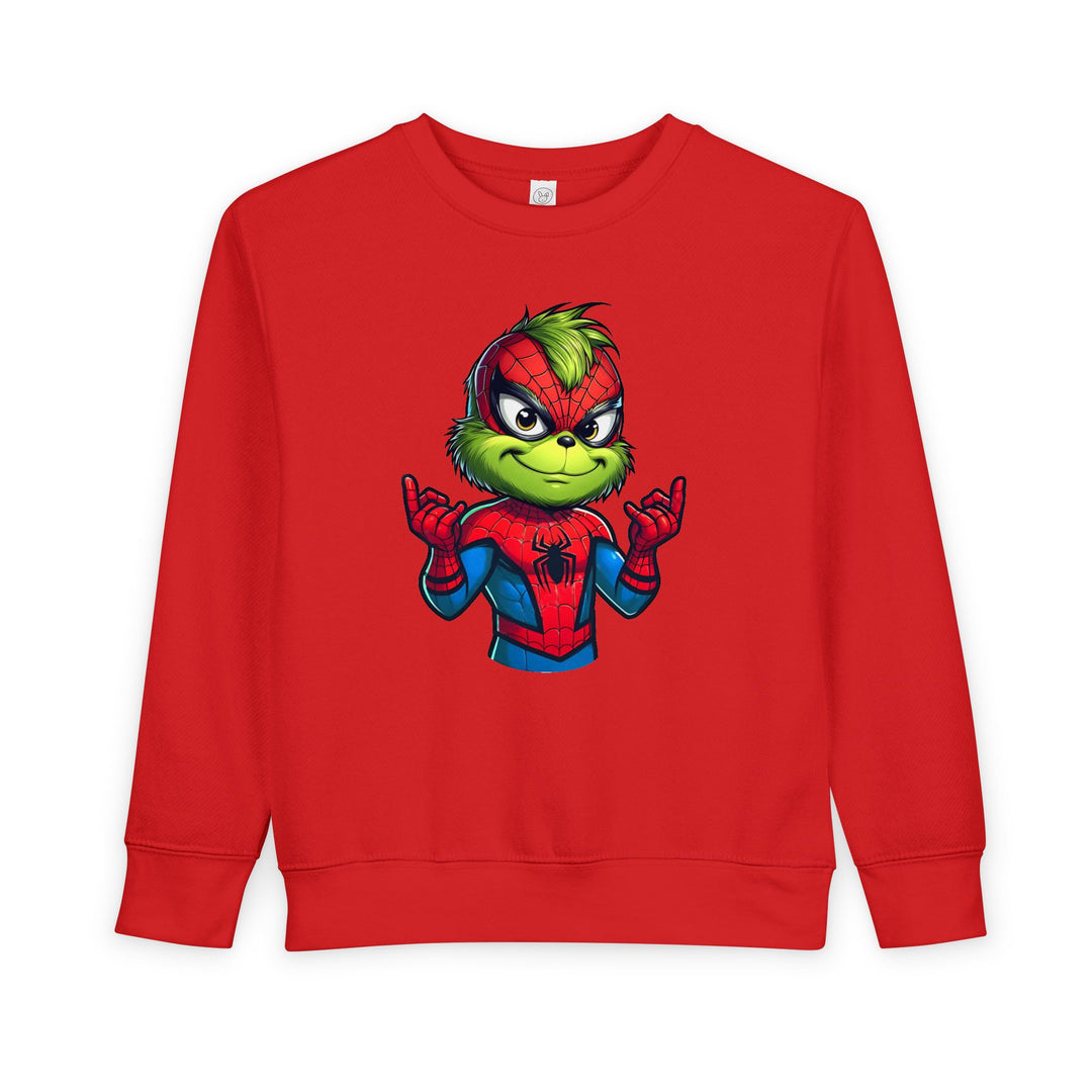 Toddler crewneck sweatshirt featuring the Grinch in a Spider-Man suit, showcasing a playful design with web-shooting gesture. Made from a cozy cotton-polyester blend.