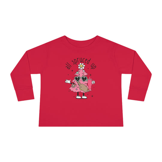 A durable toddler long-sleeve tee featuring a cartoon Christmas tree design on red fabric. Made of 100% combed ringspun cotton, with topstitched ribbed collar for comfort and EasyTear™ label for sensitive skin.