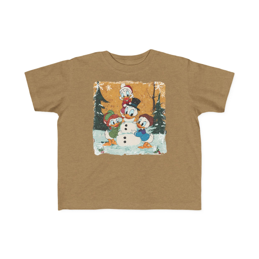 Duck Snowmen Toddler Tee featuring Donald Duck and nephews building a snowman in a snowy scene, perfect for toddlers with its soft, durable cotton fabric.