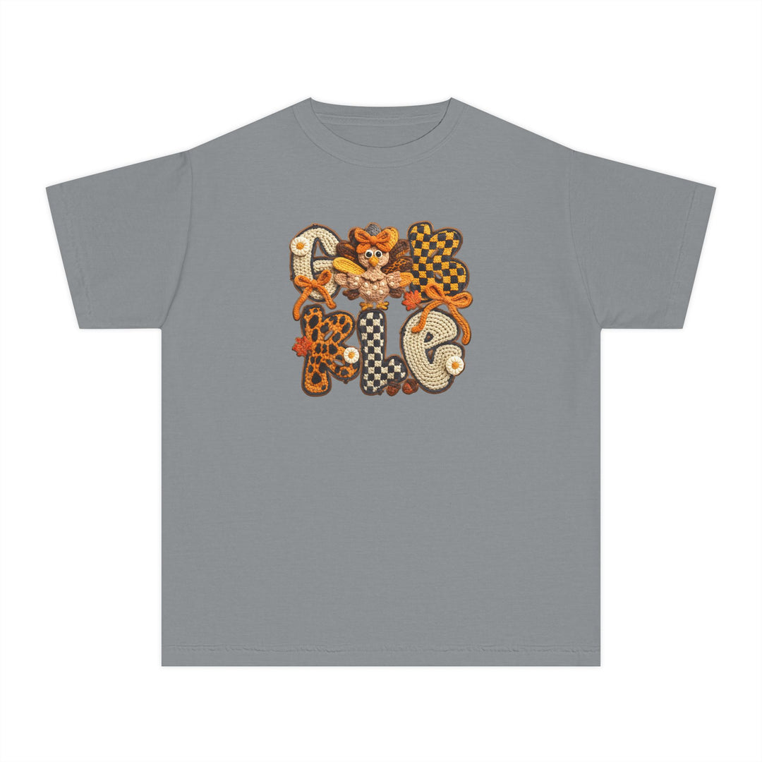 Gobble Kids Tee featuring colorful GOBBLE applique with a turkey, leaves, and pumpkin accents, designed for comfort and agility in kids' active schedules.