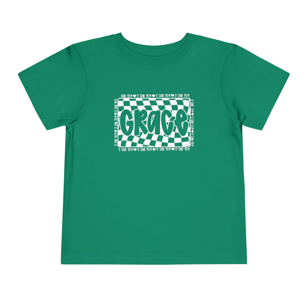Grace Toddler Tee: A green shirt featuring white text, crafted from 100% Airlume combed cotton for toddlers, offering comfort with a tear-away label.