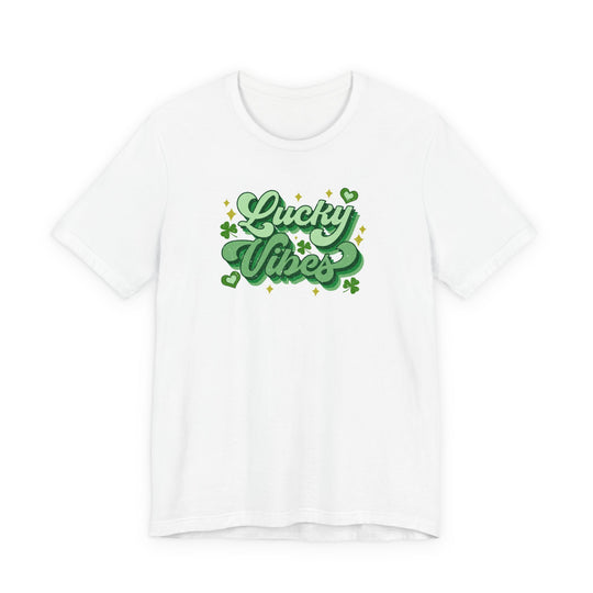 Good Day Lucky Day Tee with Lucky Vibes graphic, shamrocks, and hearts, offering a soft, comfortable fit. Perfect for St. Patrick’s Day celebrations.