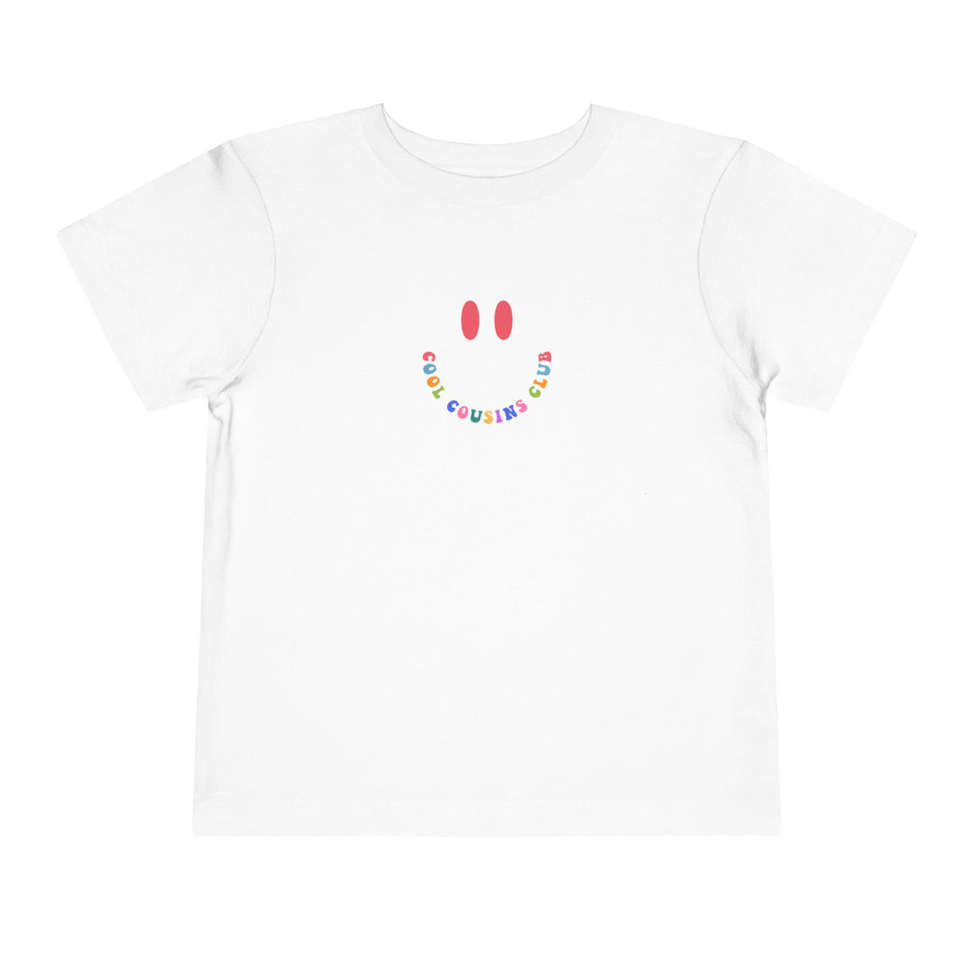 Cool Cousins Club Toddler Tee, featuring a comfortable fit with short sleeves and tear-away label, perfect for a playful addition to any child's wardrobe.