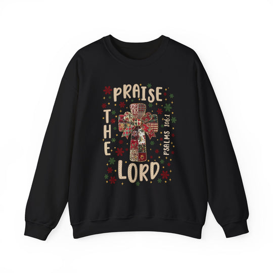 Praise the Lord Crew: Black sweatshirt with festive patchwork cross, multicolored bow, red and green motifs, gold stars, and scripture reference, offering comfort and style.