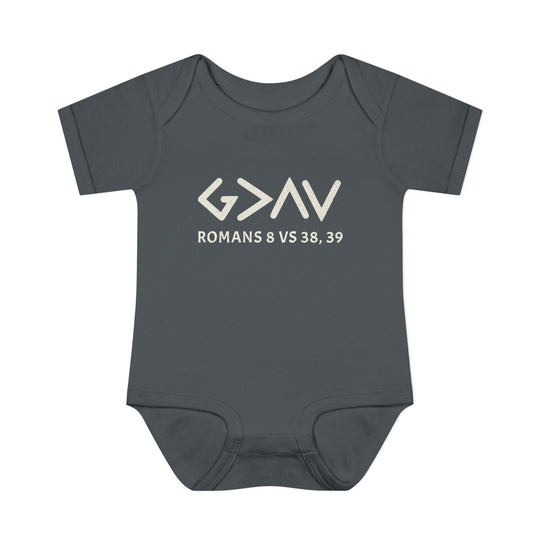 God is Greater Onesie: A grey baby bodysuit with white text, featuring lap shoulders and soft, 100% combed ringspun cotton, perfect for infants' comfort.