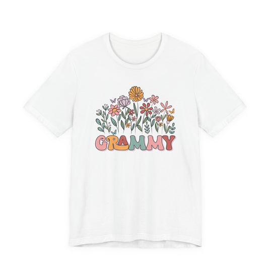 Grammy Flower Tee featuring pastel hand-drawn flowers and butterflies above GRAMMY in colorful bubble letters, on a soft, unisex cotton jersey.