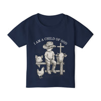 I Am a Child of God Toddler Tee featuring a child with animals, showcasing faith-inspired design on a navy-blue shirt.
