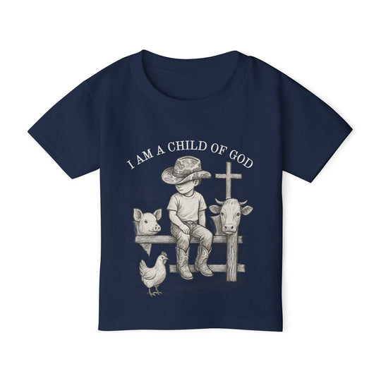 I Am a Child of God Toddler Tee featuring a child with animals, showcasing faith-inspired design on a navy-blue shirt.