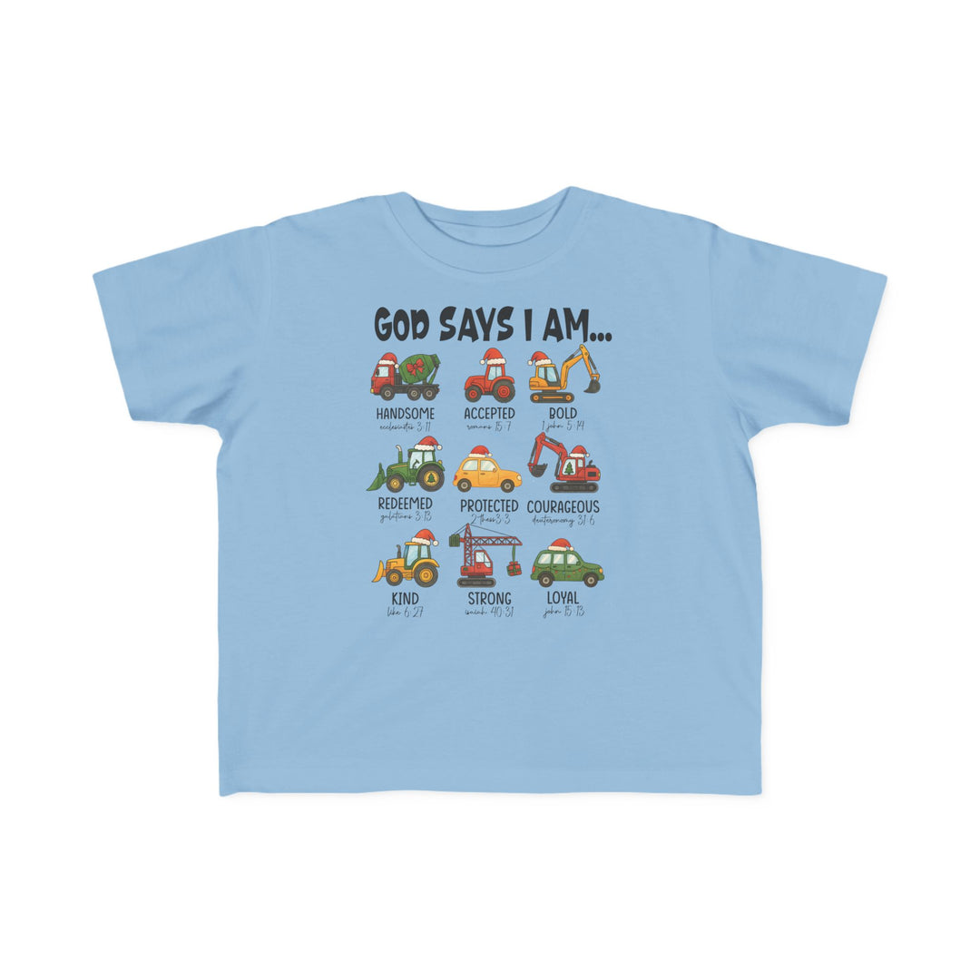 Light-blue toddler tee featuring God Says I Am with nine vehicles in Santa hats, each accompanied by an encouraging adjective and Bible reference.