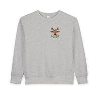 Light-grey toddler sweatshirt with embroidered cartoon reindeer and Merry & Bright lettering, showcasing cozy, durable design from Faith Family Designs.