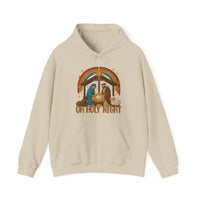Cream-colored Oh Holy Night Hoodie with a nativity scene graphic featuring Mary, Joseph, a manger, and animals, under a star and rainbow arch.