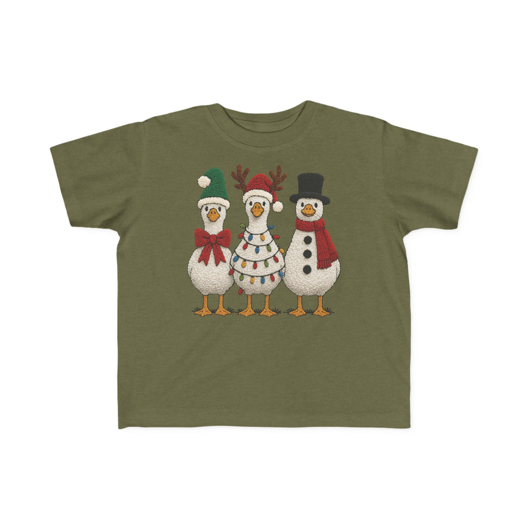 Christmas Ducks Toddler Tee featuring cartoon birds in festive attire: Santa hat, reindeer antlers with lights, and snowman style. Soft cotton, ideal for toddlers.