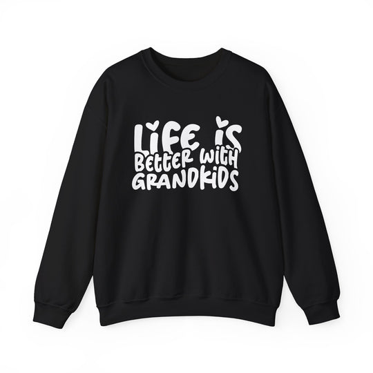 Black sweatshirt with white slogan Life is better with grandkids and heart accents, from Faith Family Designs. Unisex, comfortable blend, ribbed collar, no side seams.