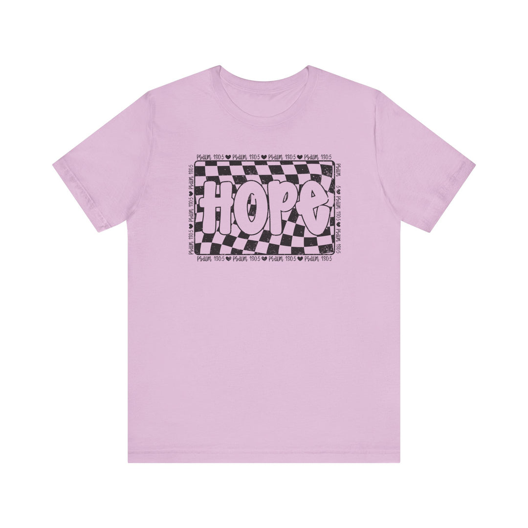 Hope Tee: Pink t-shirt featuring a black and white checkered design, crafted from soft cotton for a comfortable, well-loved fit.