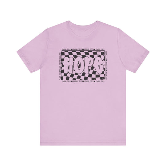 Hope Tee: Pink t-shirt featuring a black and white checkered design, crafted from soft cotton for a comfortable, well-loved fit.
