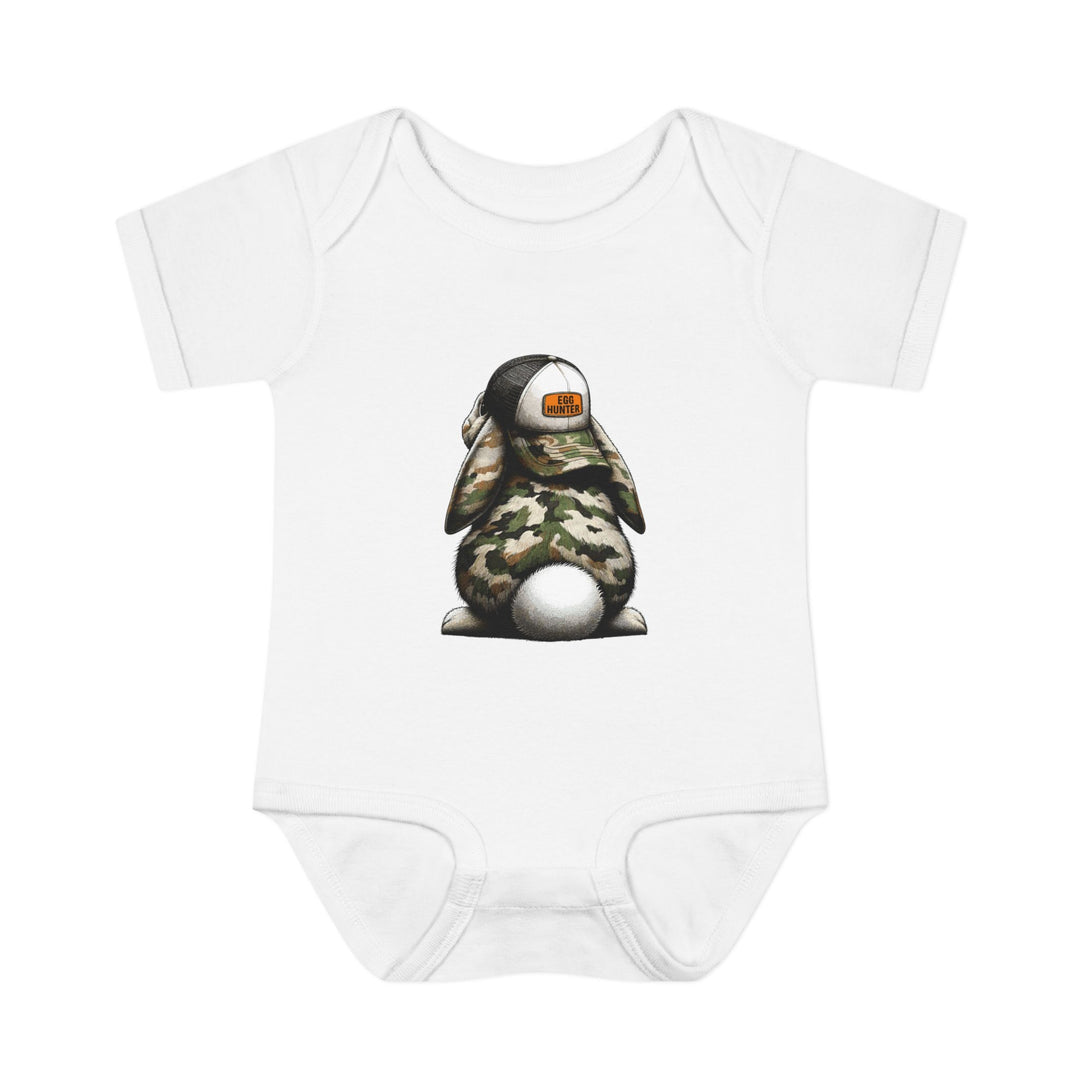 Egg Hunter Onesie: A white baby bodysuit featuring a cartoon bunny wearing a hat, made from soft ring-spun cotton for comfort. Ideal for infants, with lap shoulders for easy dressing.