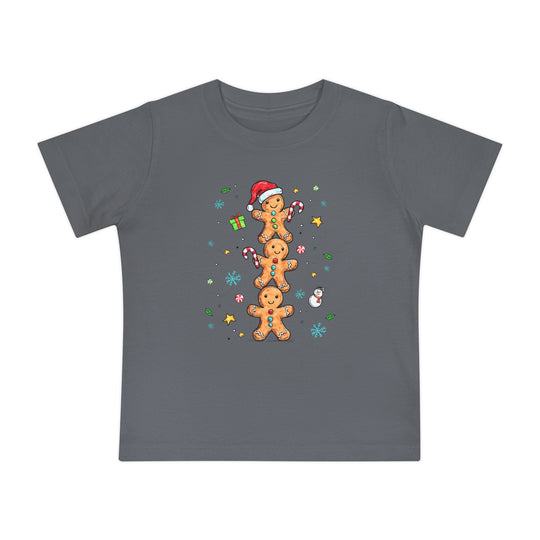 Gingerbread Stack Baby Tee featuring a festive design with gingerbread figures, candy canes, and snowflakes on a dark-gray, soft, durable children's T-shirt from Faith Family Designs.