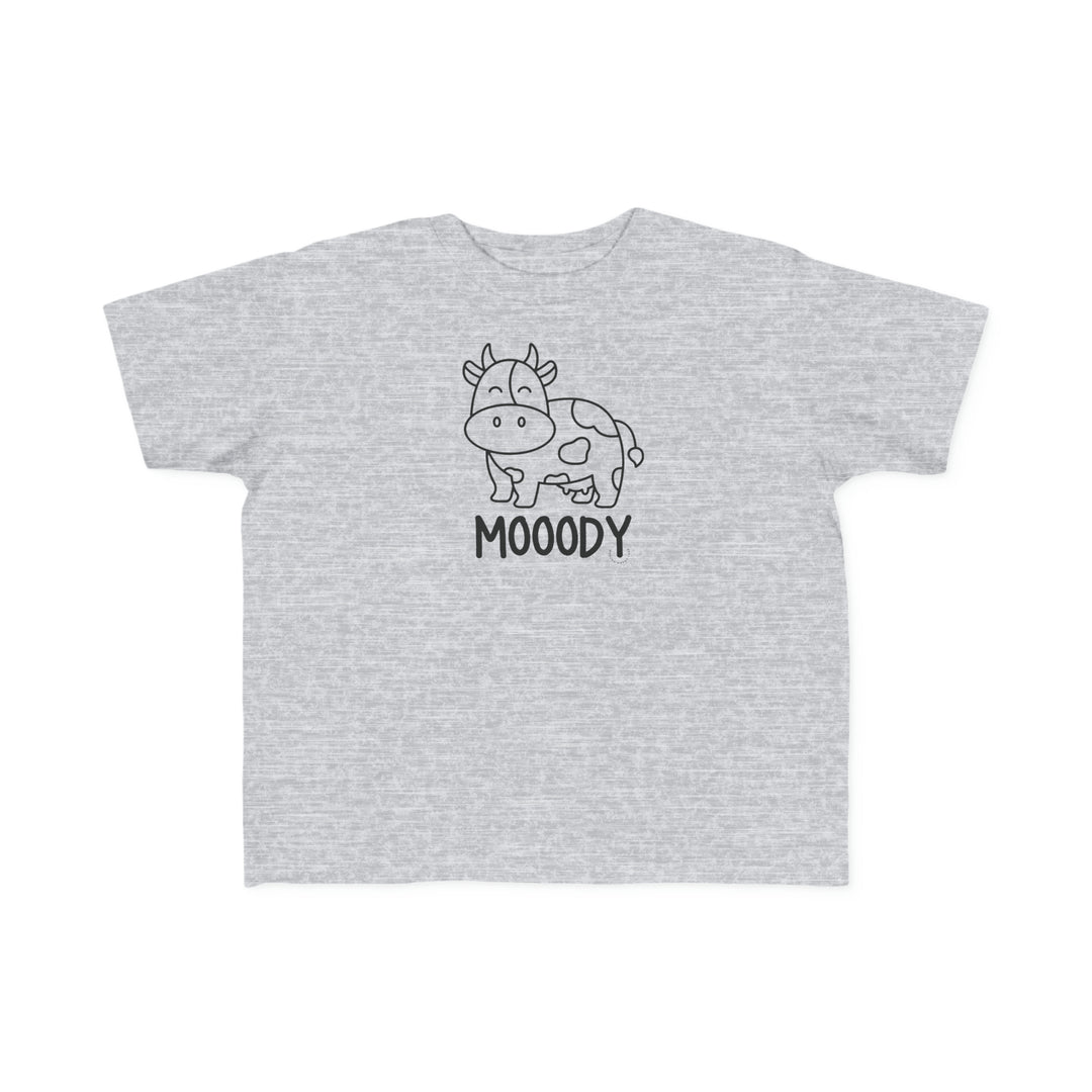Moody Toddler Tee featuring a cow print on grey fabric. Soft and durable for sensitive skin, made of 100% combed ringspun cotton, light fabric, classic fit, tear-away label, and true to size.