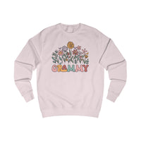 Light-pink crewneck sweatshirt with a colorful floral and butterfly graphic, featuring GRAMMY in retro letters, made from soft cotton-polyester blend for comfort.
