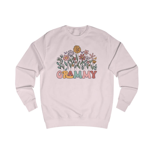 Light-pink crewneck sweatshirt with a colorful floral and butterfly graphic, featuring GRAMMY in retro letters, made from soft cotton-polyester blend for comfort.