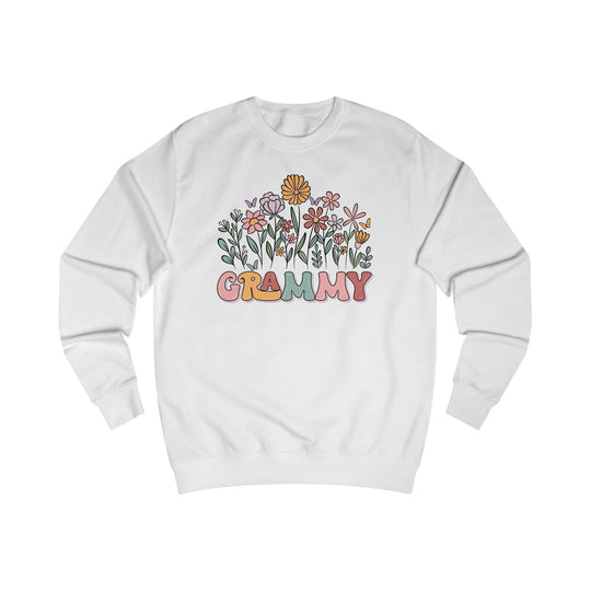 White crewneck Grammy Flower Sweatshirt featuring pastel bubble letters, doodled wildflowers, and butterflies. Unisex, cotton-polyester blend with ribbed seams and elastic collar.