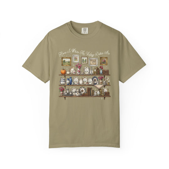 Vintage Dishes Tee featuring a vintage-kitchen illustration with shelves of china and decor, and a slogan, emphasizing comfort from the Comfort Colors line.