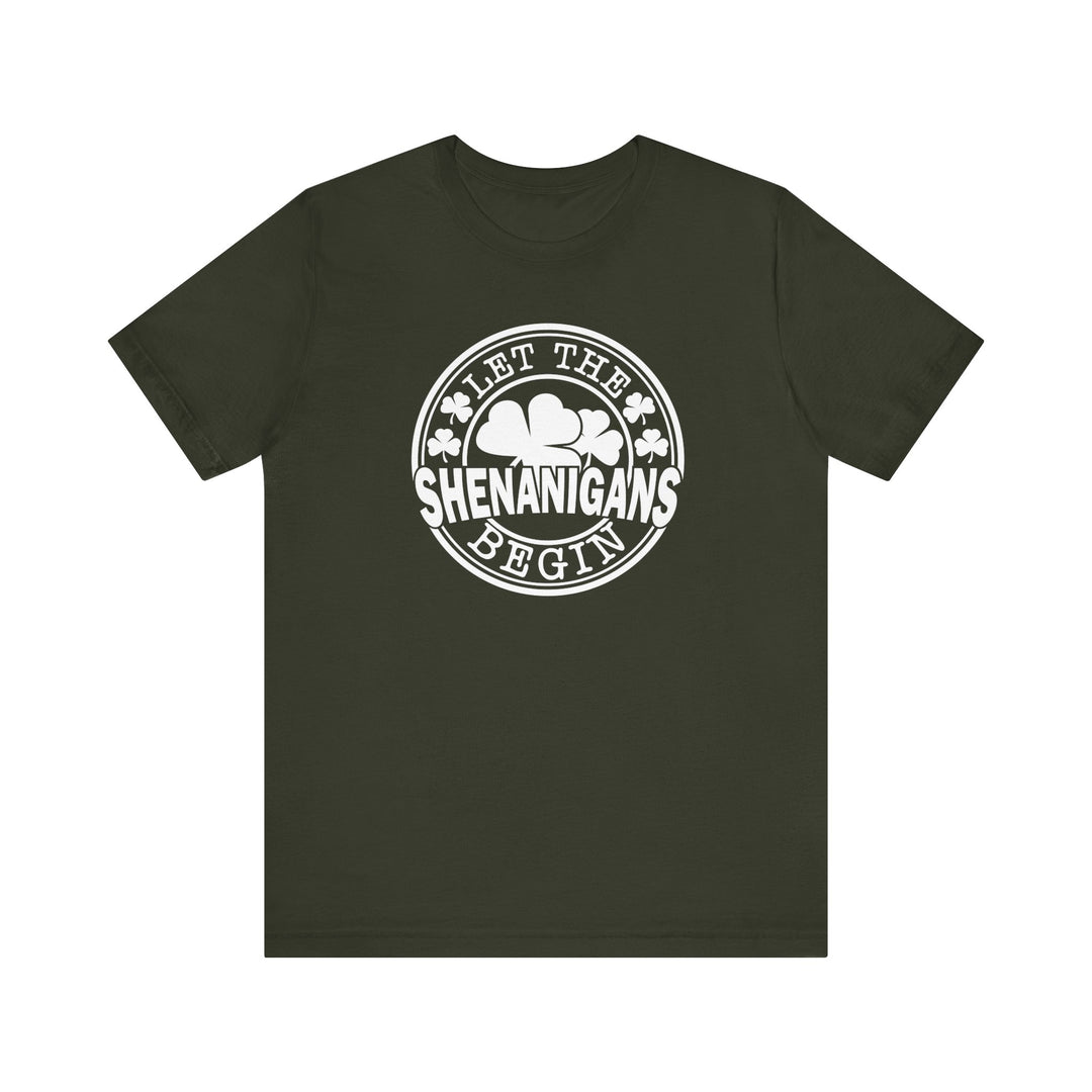 Let The Shenanigans Begin Tee featuring white text on a green shirt, classic fit with ribbed knit collars and dual side seams for durability.