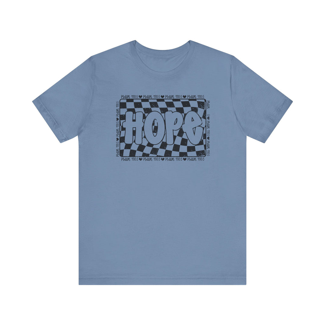 Hope Tee: A blue t-shirt with a black and white graphic design, showcasing a classic unisex fit with ribbed knit collars and durable stitching.