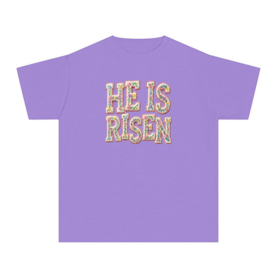 He is Risen Kids Tee with floral embroidered lettering on lavender fabric, crafted for comfort in 100% combed cotton, ideal for active kids.