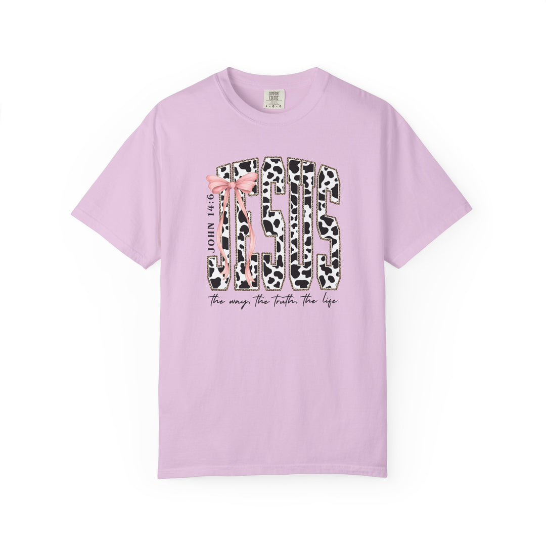Light lavender-pink John 14:6 Tee featuring a cow-print JESUS graphic, glitter accents, pink bow, and script quote, the way, the truth, the life.