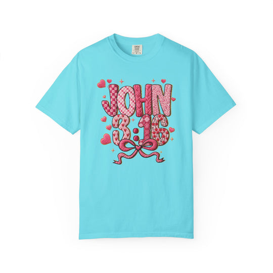 3:16 Tee with JOHN 3:16 in bubble letters, heart patterns, and a pink bow, offering stylish comfort with a relaxed fit.
