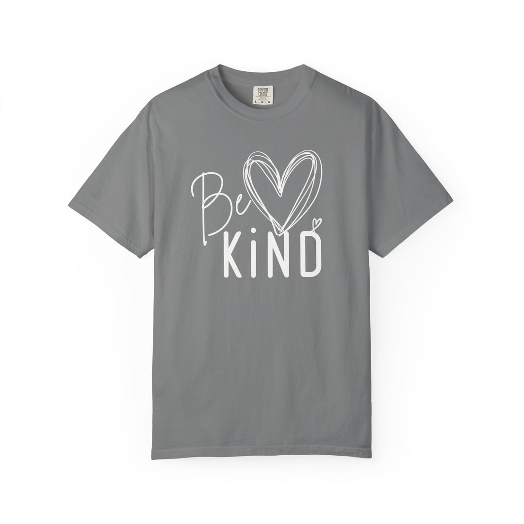Be Kind Tee: Grey short-sleeve T-shirt featuring Be KIND in mixed fonts with heart designs, emphasizing kindness. Available in various sizes for a comfortable fit.