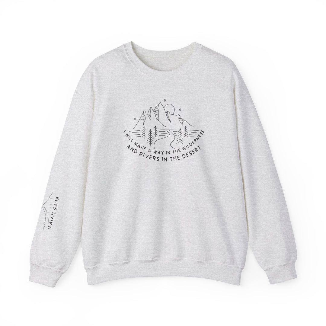 A white crewneck sweatshirt featuring a mountain and tree design, made from a cozy blend of polyester and cotton. Classic fit with ribbed knit collar and durable double-needle stitching. Ethically crafted for comfort and style.