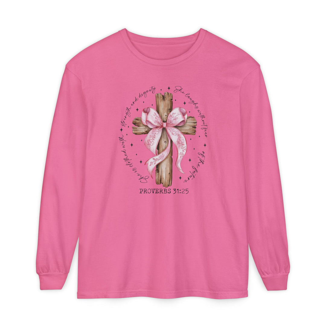 Proverbs 31:25 Long Sleeve Tee featuring a rustic cross with a pink ribbon and inspirational text. Made from soft, 100% ring-spun cotton for a relaxed fit.