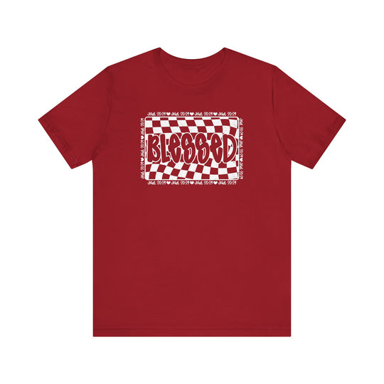 Blessed Tee: Classic red unisex t-shirt with white text, featuring ribbed knit collars and dual side seams for lasting shape, made of soft, quality cotton.